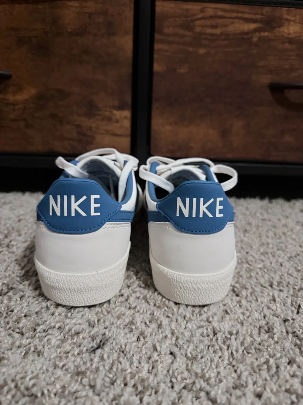 Nike Men’s White Sneakers with Blue Swoosh